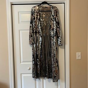 Shear, sequins duster.